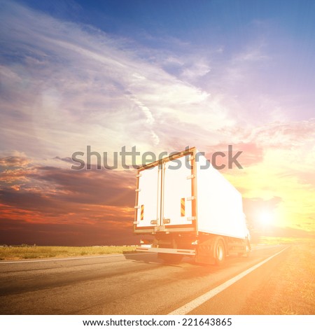 The truck with freight moving fast
