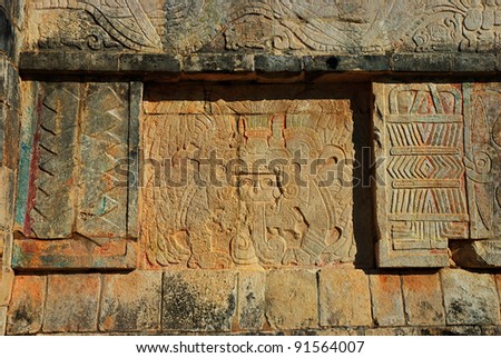 Wall with Mayan carvings at Chichen Itza, Quintana Roo, Mexico. Mayan ruins  near Cancun.