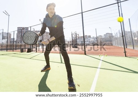 Similar – Image, Stock Photo senior man playing paddle tennis at indoors pitch, he is tired