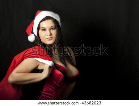 Young sexy Girl too black long Hair,in the Santa Claus Costume