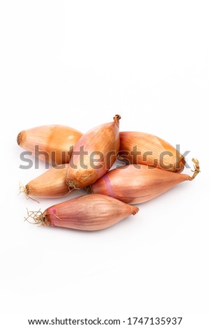 Shallot onions on white background in studio Foto d'archivio © 