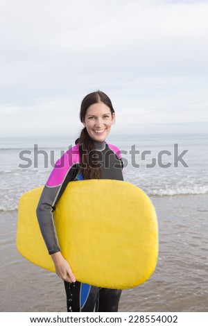 Young Woman with Body Board