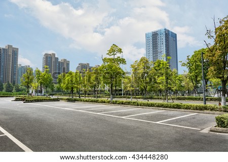 Similar – Image, Stock Photo Empty parking space in the backyard of a commercial / residential area