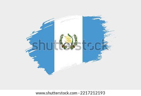 Creative hand drawn grunge brushed flag of Guatemala with solid background