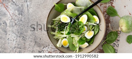 Similar – Image, Stock Photo Spinach salad with eggs avocados tomatoes and mozzarella cheese