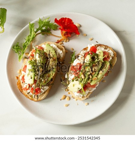 Similar – Image, Stock Photo Delicious avocado and ricotta toast served on plate