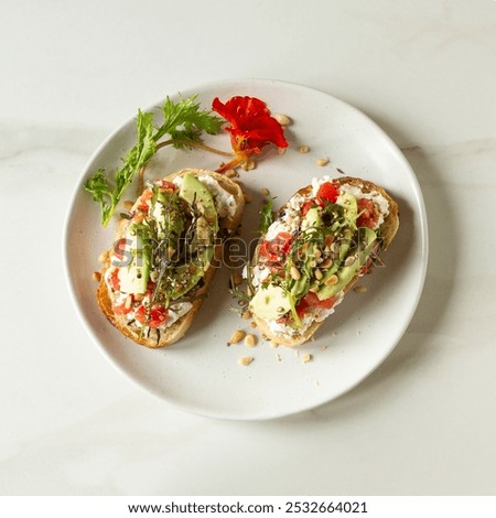 Similar – Image, Stock Photo Delicious avocado and ricotta toast served on plate