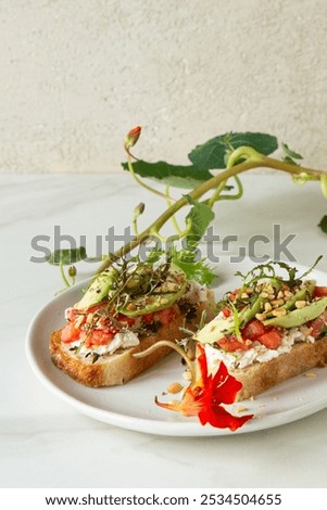 Similar – Image, Stock Photo Delicious avocado and ricotta toast served on plate