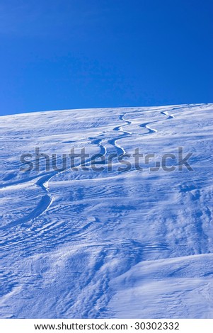 mountain tracks in the snow snowboard sport