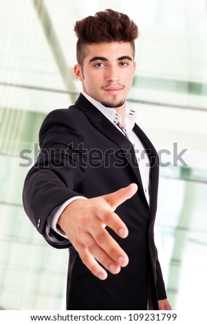Business man giving hand for handshake