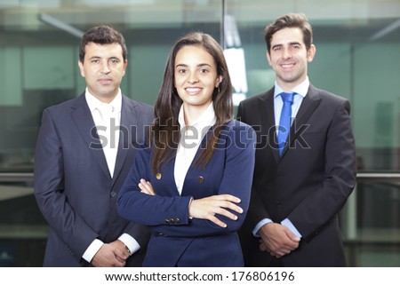 Businesswoman leader on the foreground of his team