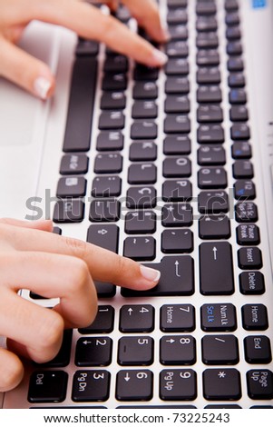 Close-up of secretary hands touching computer key during work
