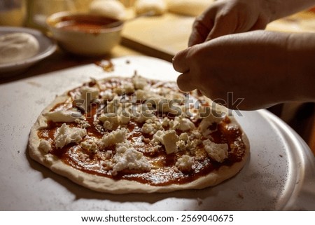 Similar – Foto Bild Hausgemachte Pizza auf hellem Tisch mit Nudelholz und Zutaten, Ansicht von oben