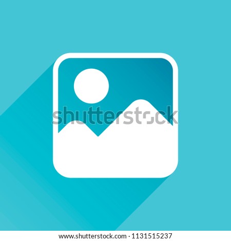 Simple picture icon. Gray icon with long shadow in bottom left corner on blue background