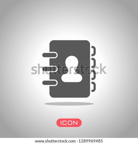 address book with person on cover. simple icon. Icon under spotlight. Gray background