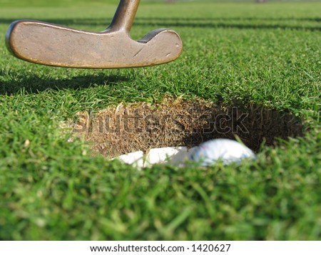 Putting a ball in the hole