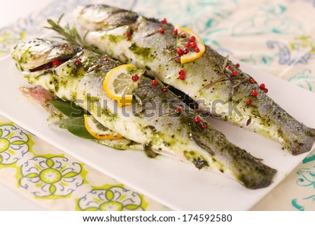 marinated fish with rosemary, pepper and lemon