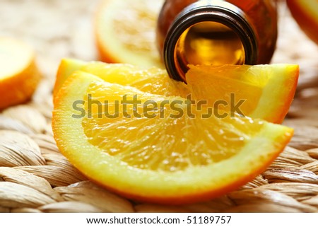 bottle of oranges essential oil - beauty treatment