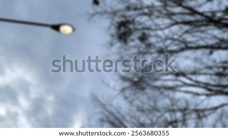 Similar – Foto Bild Straßenlaterne / Ihr Spiegelbild betrachtend / Nach starkem Regen.