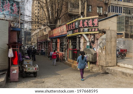 BEIJING, CHINA-MARCH 2014:-The everyday people do not shop in trendy malls in China, March 2014 in Beijing. The shops and market stalls for the majoprity of the chinese people.