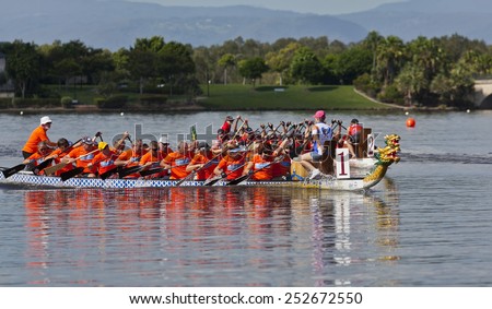 GOLD COAST, QUEENSLAND, AUSTRALIA-1st FEBRUARY 2015:-Dragon boat racing is a competitive team sport taking place at Emerald lakes, Gold Coast