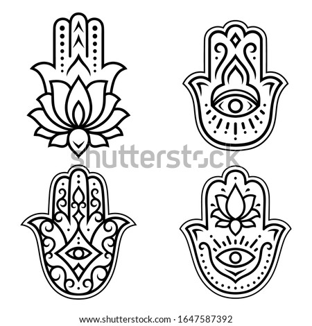 Set of Hamsa hand drawn symbol with lotus flower. Decorative pattern in oriental style for interior decoration and henna drawings. The ancient sign of 