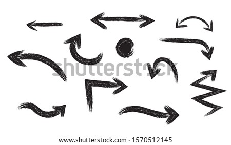 Arrows set on a white background. Different brush pointers.Paint object for use in your design.Arrow hand drawn vector.Creative drawing grunge rough.Up right down