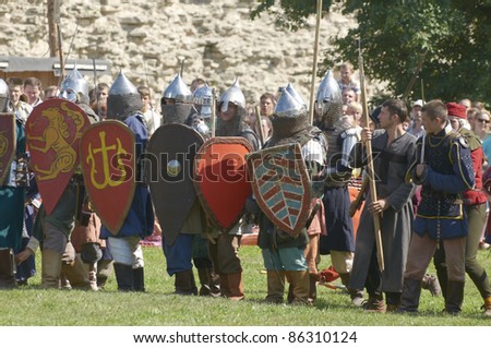 IZBORSK, RUSSIA - AUGUST 6: Unidentified men in a knightly armor take part in festival \