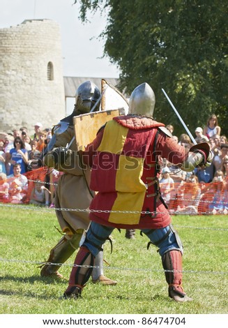 IZBORSK, RUSSIA - AUGUST 6: Unidentified man in a knightly armor take part in festival \