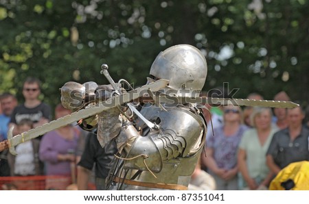 IZBORSK, RUSSIA - AUGUST 6: Unidentified man in a knightly armor takes part in festival \