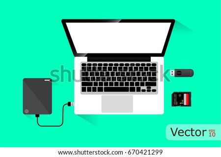 Laptop and Hard disk storage, Vector design on green background.