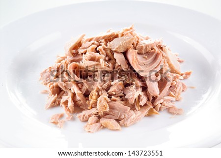 Tuna. canned fish on white plate