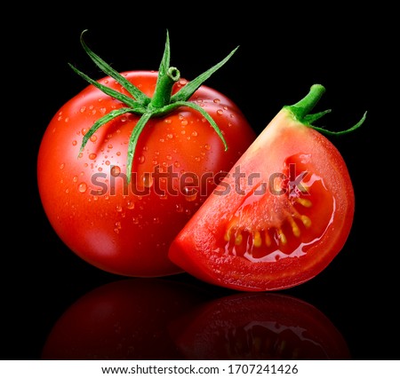 Tomato isolated. Tomato with drops on black. Tomato whole and slice side view. Wet tomato black background.