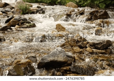 Image, Stock Photo Foamy mountain stream flowing through stones in sunlight