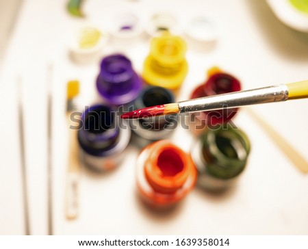Paint brush close up and blurred paints Stok fotoğraf © 