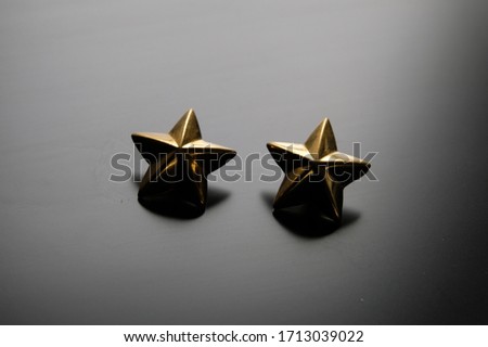 Two golden rank stars close up Stok fotoğraf © 