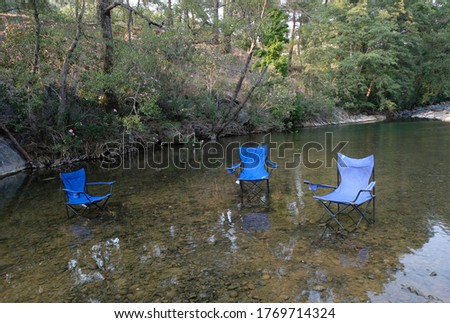 Empty blue chairs in river Stok fotoğraf © 