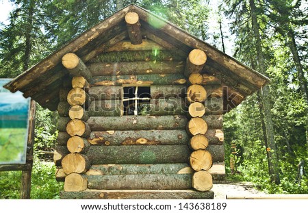 fairy log wooden houses in summer forest