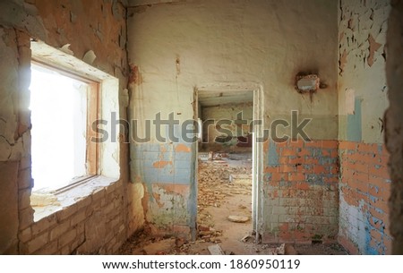 Abandoned building with door and window frame. The gloomy place was empty and dilapidated Photo stock © 