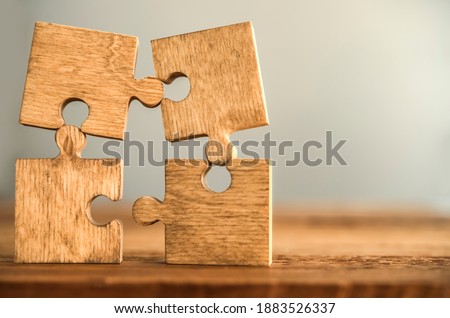 Similar – Image, Stock Photo Wooden puzzle pieces as background