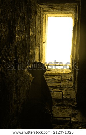 idea of smoking aids disease of mental illness horrible dreams Silhouette woman in dark texture concrete hole standing on metal ladder white sky or heaven background Empty copy space for inscription