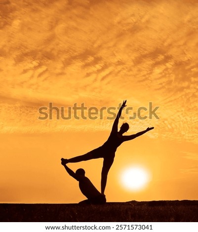 Similar – Image, Stock Photo Man doing acrobatic in the beach. Moody weather and rain