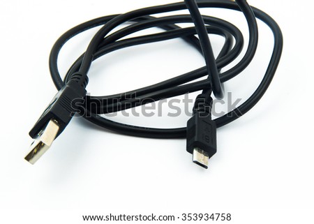 USB cable connection to connect the charger to the phone Imagine de stoc © 