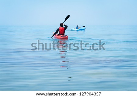 Kayak. People kayaking in the ocean