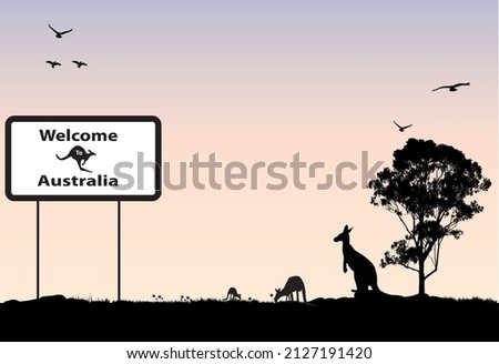 Australian scene with sign of welcome to australia. Kangaroos and gum trees