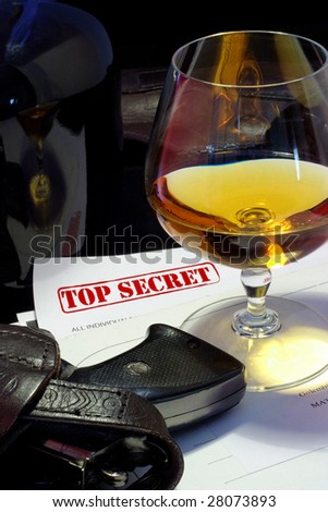 top secret documents, guns, cognac - spy celebrating a victory