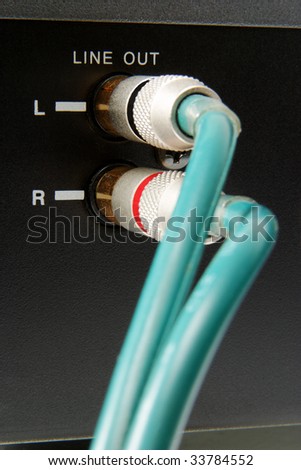 connected hi-end analog audio cables with gold connectors
