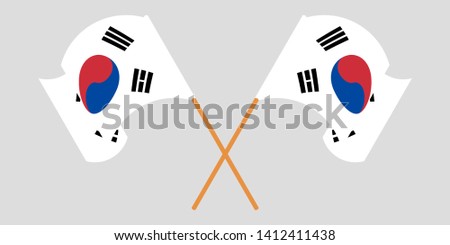 Crossed and waving flags of South Korea