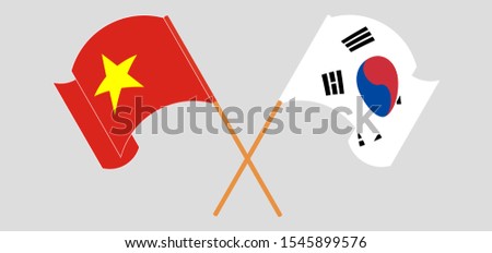 Crossed and waving flags of Vietnam and South Korea. Vector illustration
