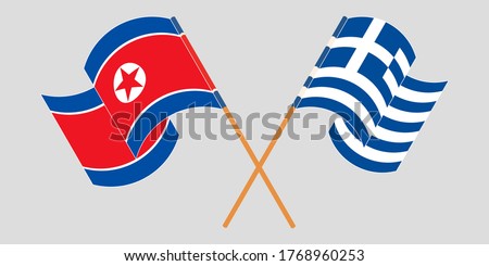Crossed and waving flags of North Korea and Greece